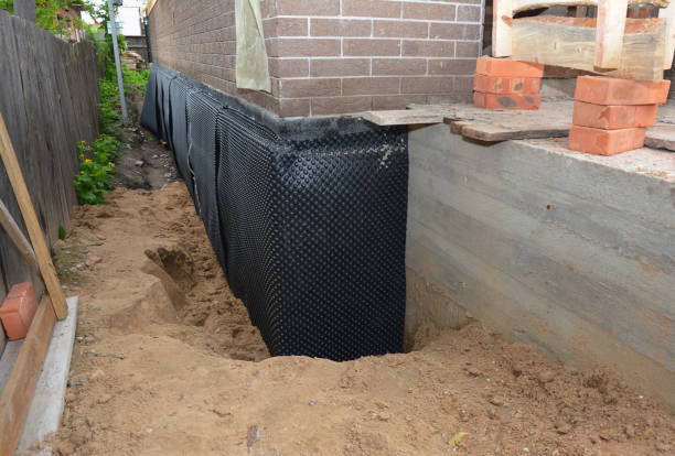 SJ Waterproofing Pros technician performing targeted Vapor Barrier Installation assessment in Avon, NY